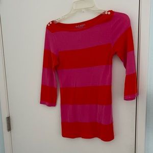T-shirt hot pink and orange striped.